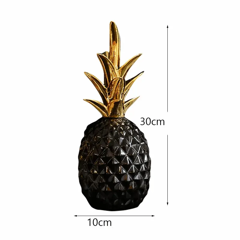 a black and gold pineapple shaped vase