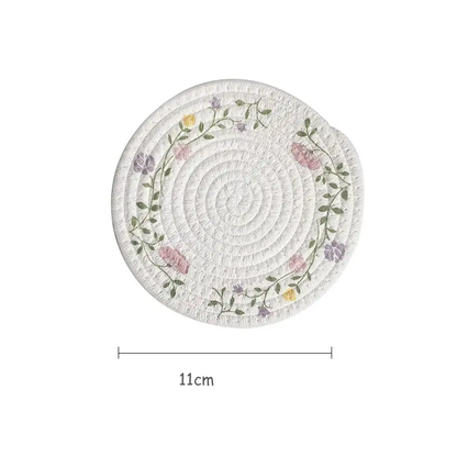 a white plate with a floral design on it