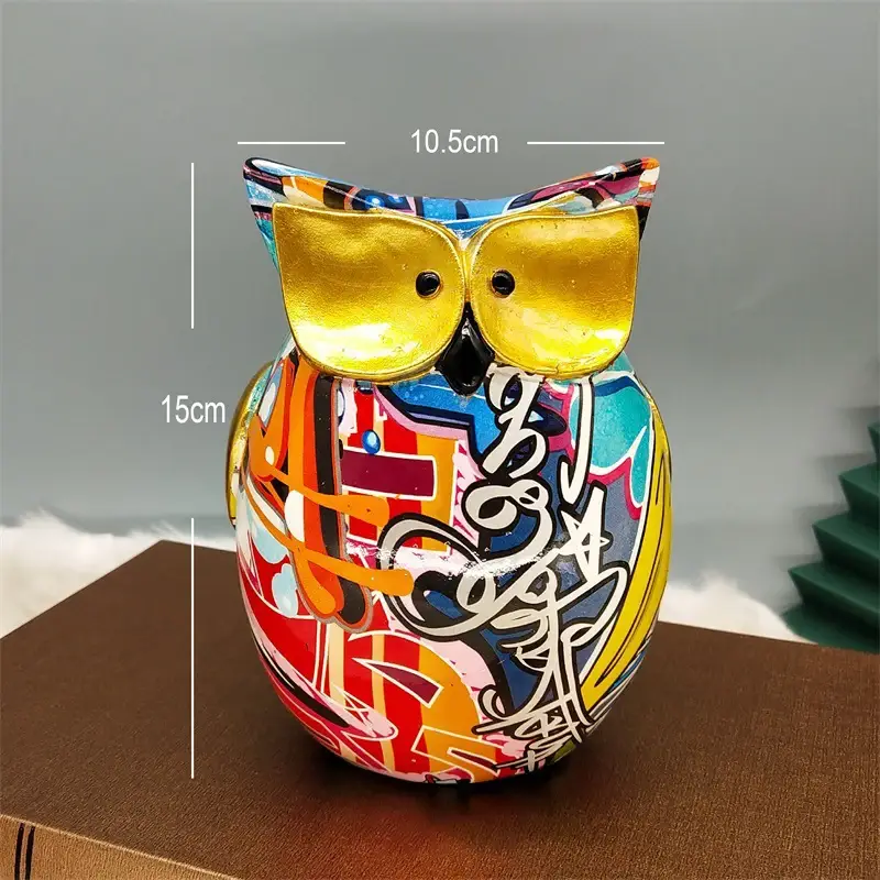 a colorful owl figurine with sunglasses on top of it
