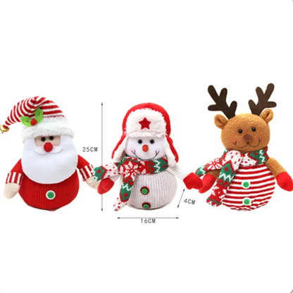three stuffed animals wearing christmas sweaters and hats