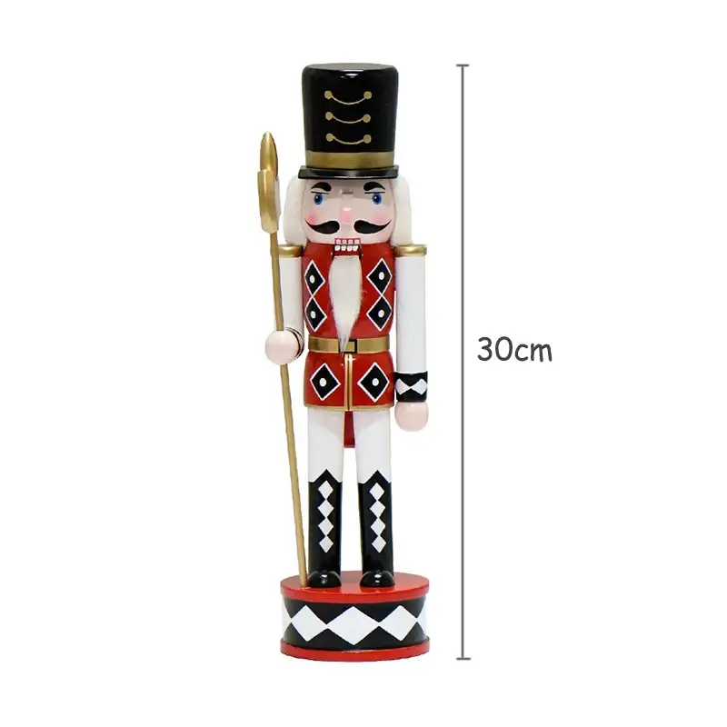 a wooden nutcracker with a cane on a white background