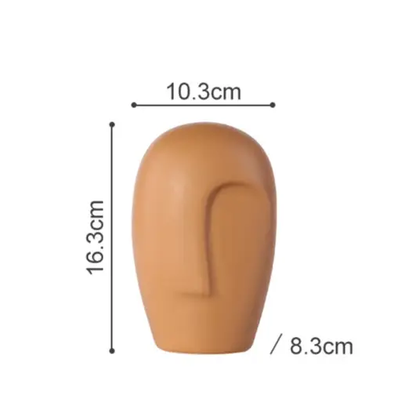 a brown mannequin head is shown with measurements