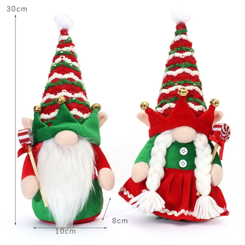 two small christmas gnomes with red, green and white hats