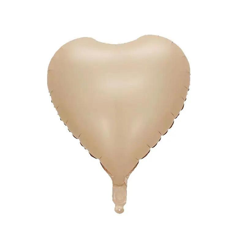 a heart shaped balloon on a white background