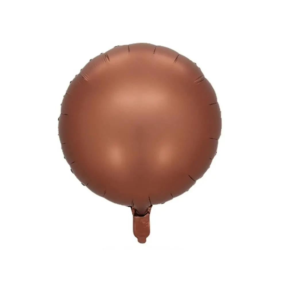a brown balloon on a white background