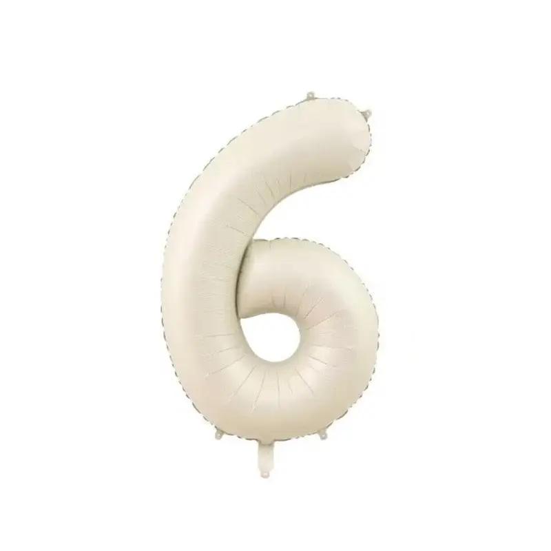 a white number six balloon on a white background