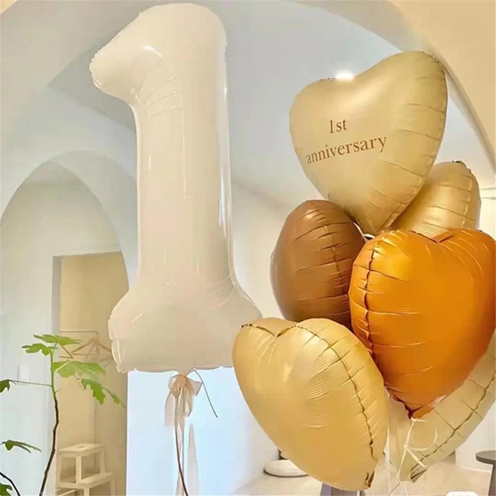 a bunch of balloons that are in the shape of a 1
