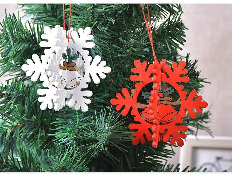 a close up of two ornaments on a christmas tree