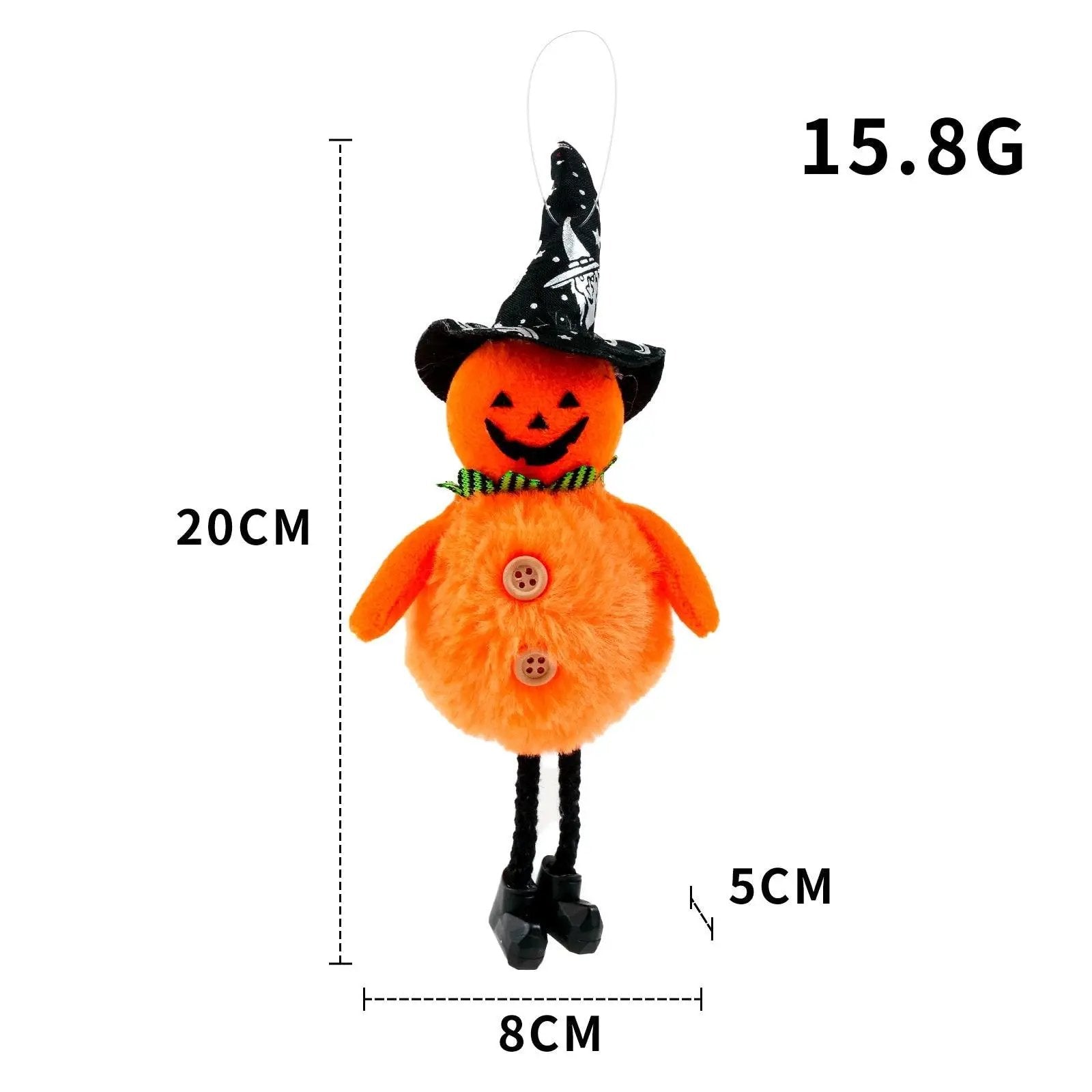 a small orange stuffed animal wearing a witches hat