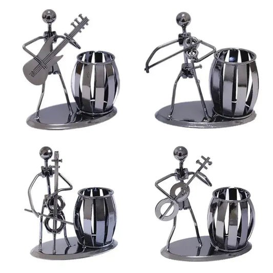 a set of four metal figurines with musical instruments