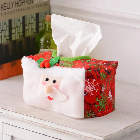 a tissue box with a santa clause on it