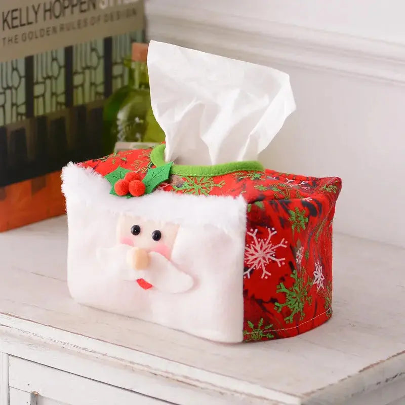 a tissue box with a santa clause on it