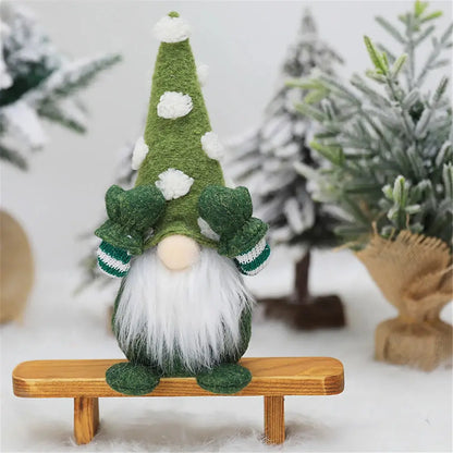 a green and white gnome sitting on a wooden bench