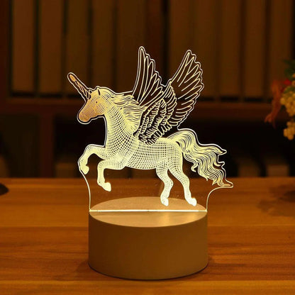 a light up unicorn on a wooden table