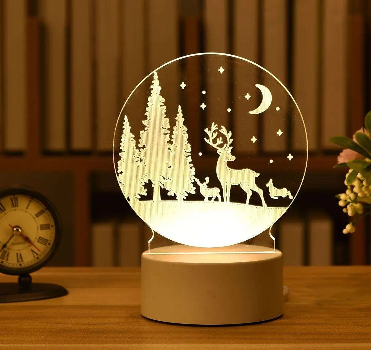 a snow globe with a deer and a deer on it