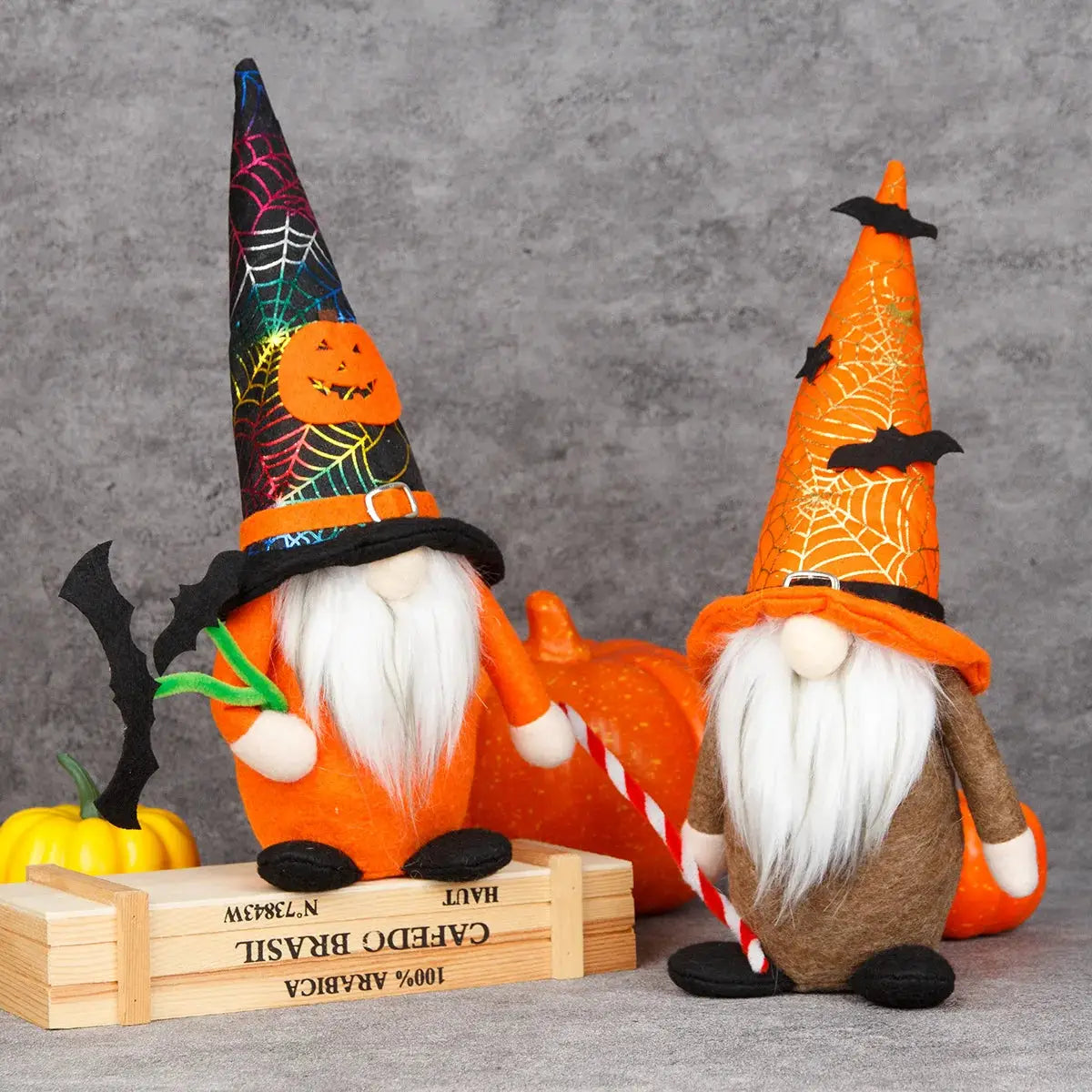 a couple of gnomes sitting next to each other