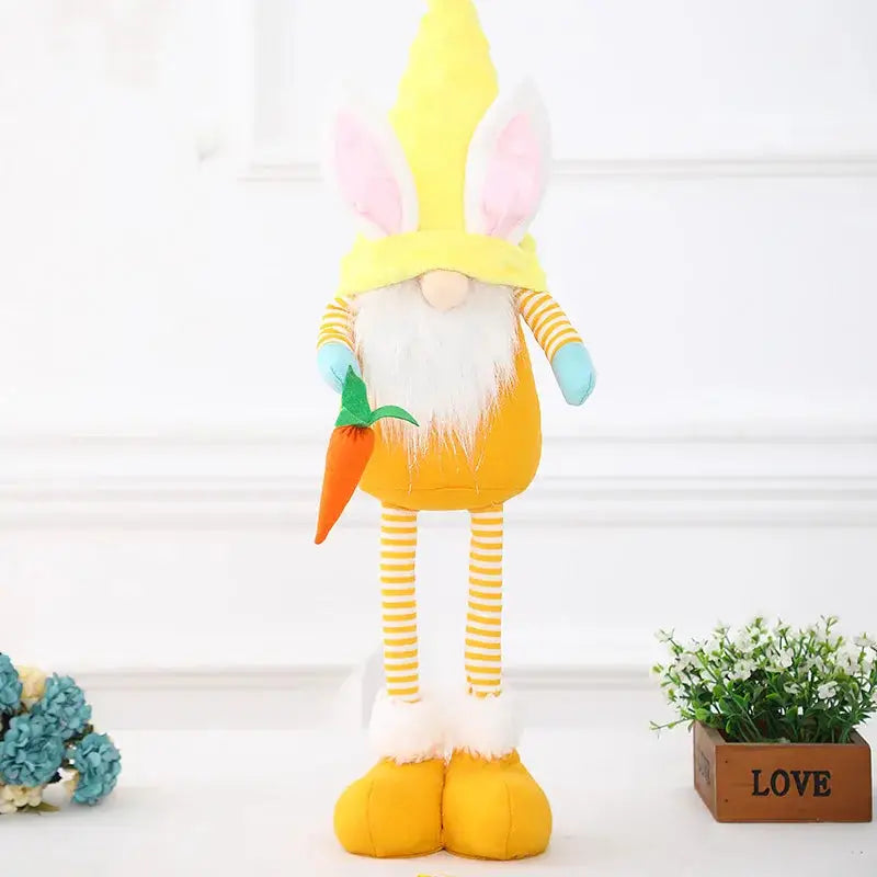 a stuffed toy with a carrot on it