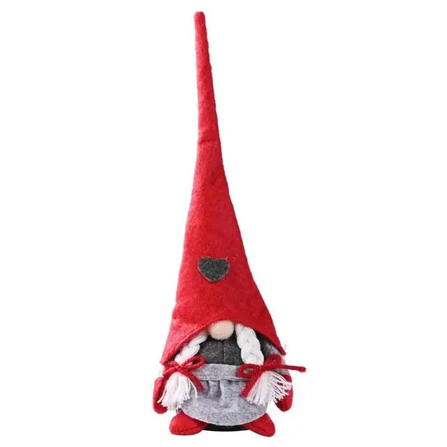 a red and gray gnome hat with a heart on it