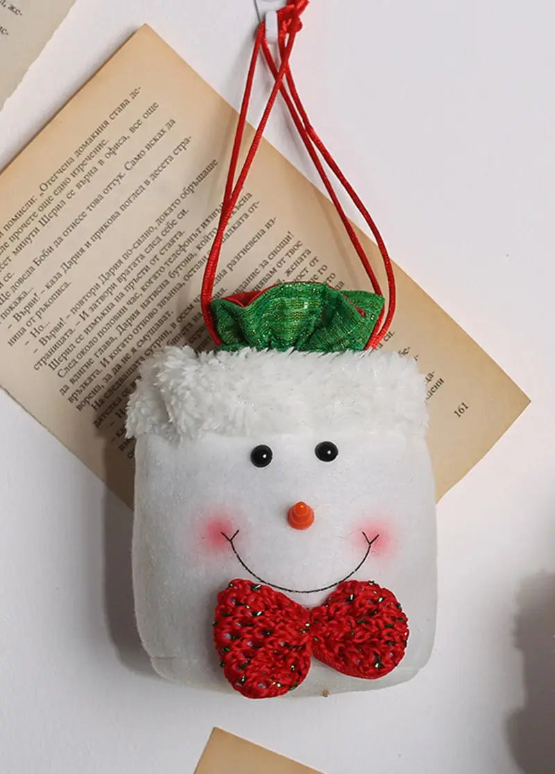 a christmas ornament hanging from a book