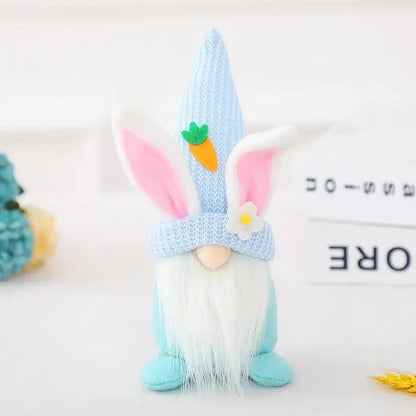 a stuffed animal with a knitted hat and bunny ears