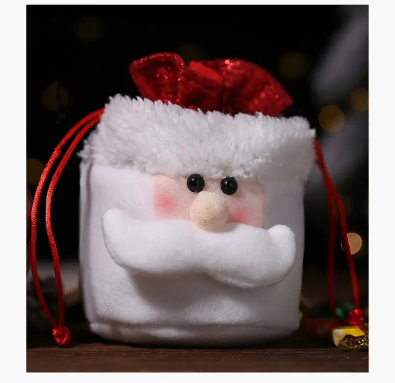 a santa clause bag with a red bow on it