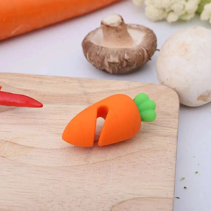 a wooden cutting board topped with carrots and mushrooms