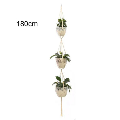 three hanging planters with plants in them
