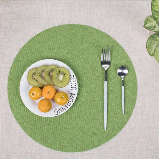a plate with kiwis and oranges on it