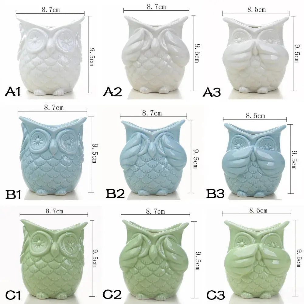 a set of six ceramic owls sitting next to each other