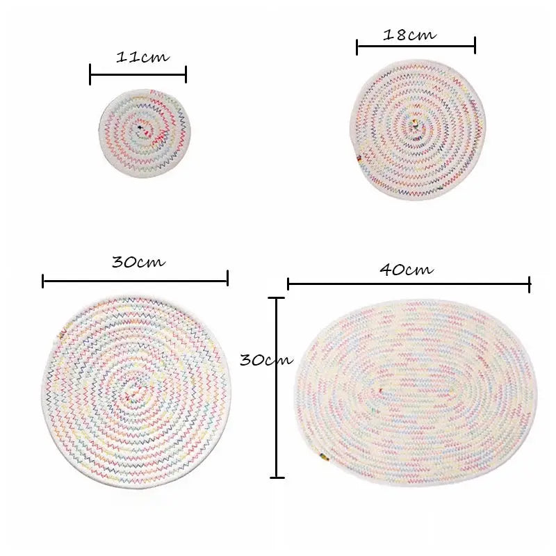 three different sizes of round rugs on a white background