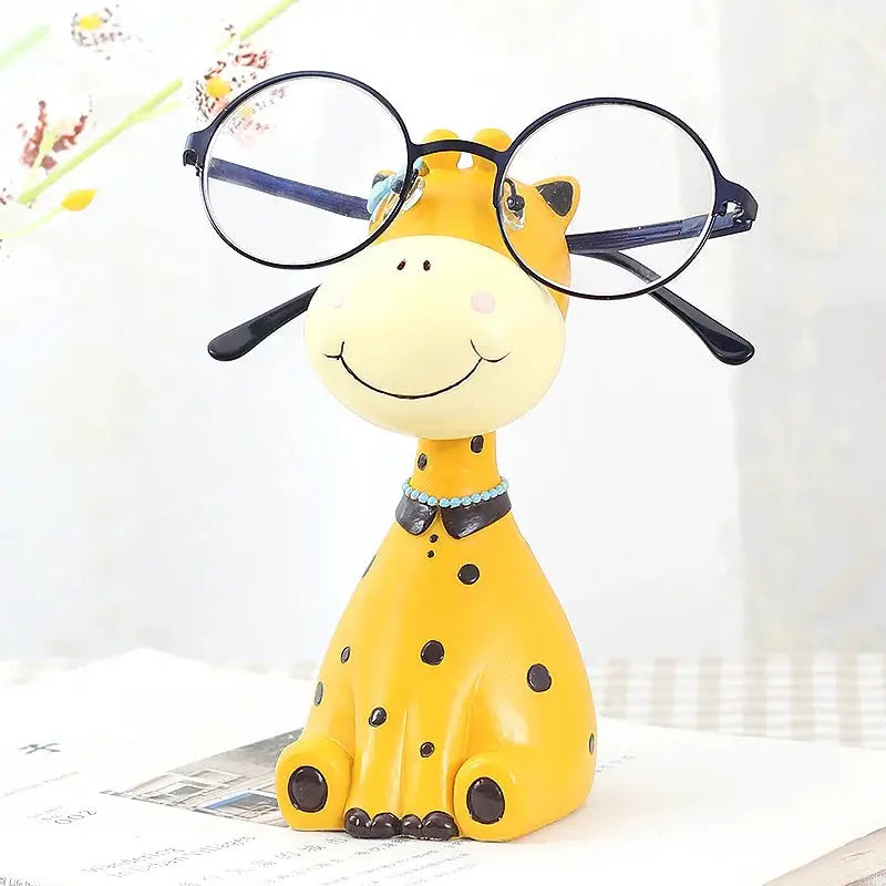 a toy giraffe with glasses on its head