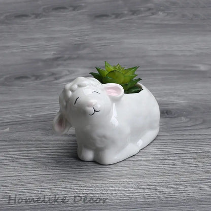 a ceramic sheep planter with a succulent in it