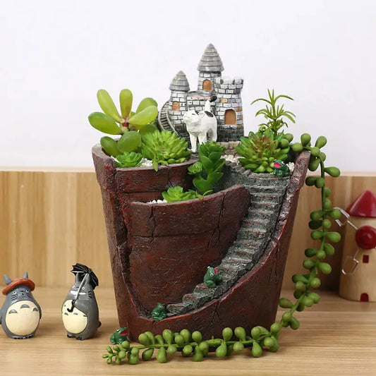a planter with plants in it sitting on a table