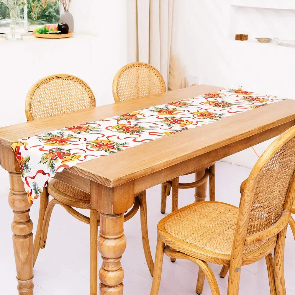 a wooden table with a floral table cloth on it