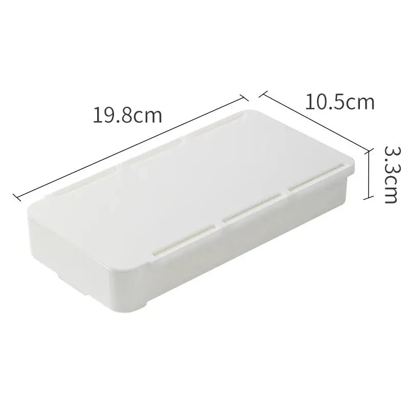 a white plastic tray with measurements and measurements