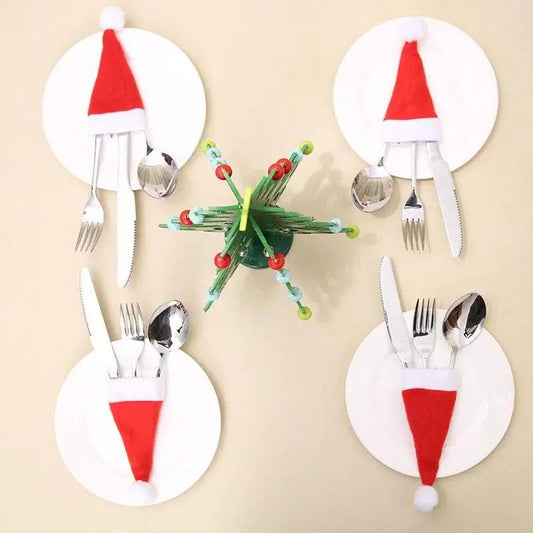 a set of four christmas themed place settings