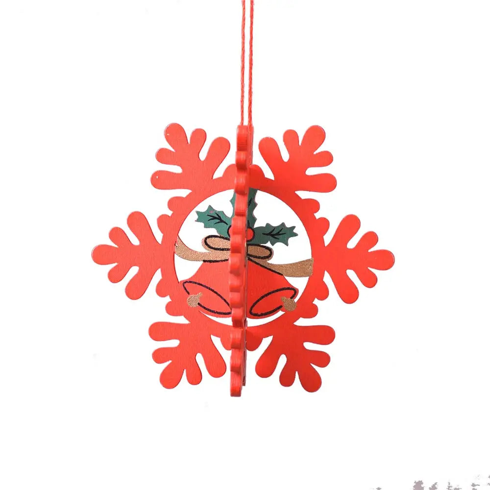 a paper snowflake ornament hanging from a string