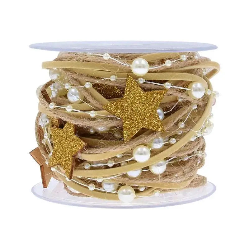 a spool of twine with gold stars and pearls