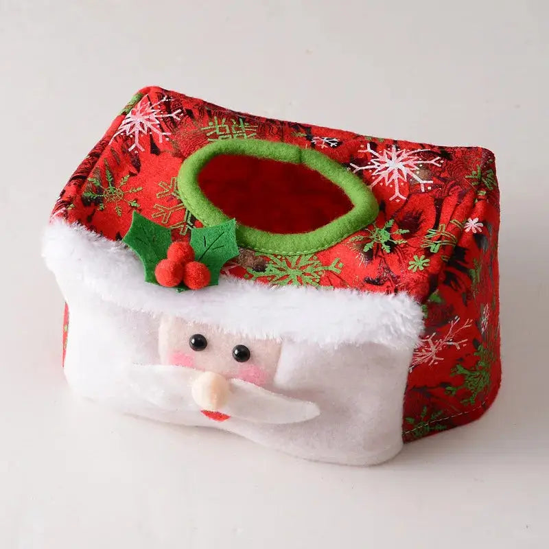 a christmas present box with a santa hat on top of it