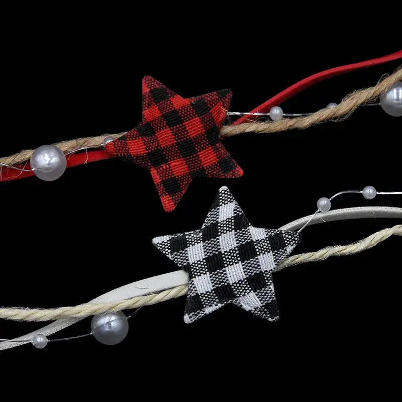 a red and black plaid star and a black and white checkered star on a