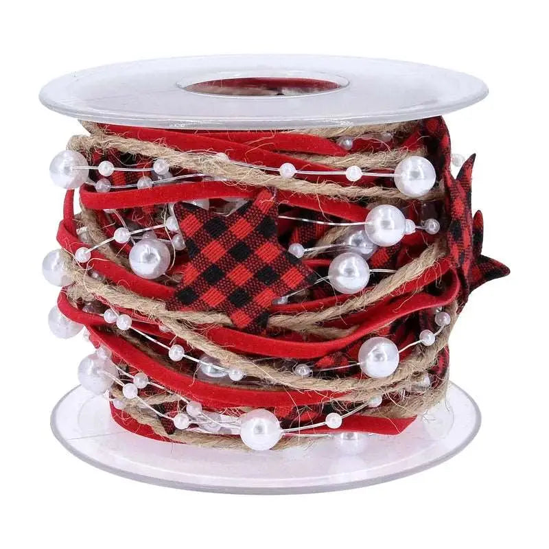 a spool of red and black ribbon with white pearls