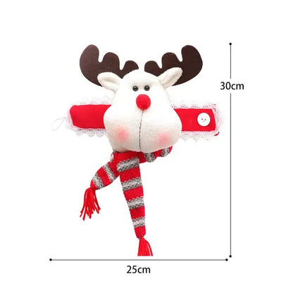 a stuffed reindeer with a scarf on it's head