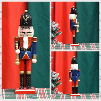 a nutcracker figurine with a christmas tree in the background
