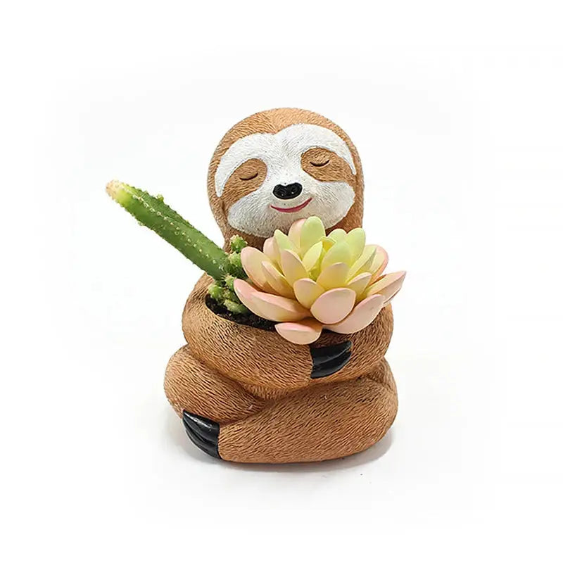 a small statue of a slotty holding a succulent