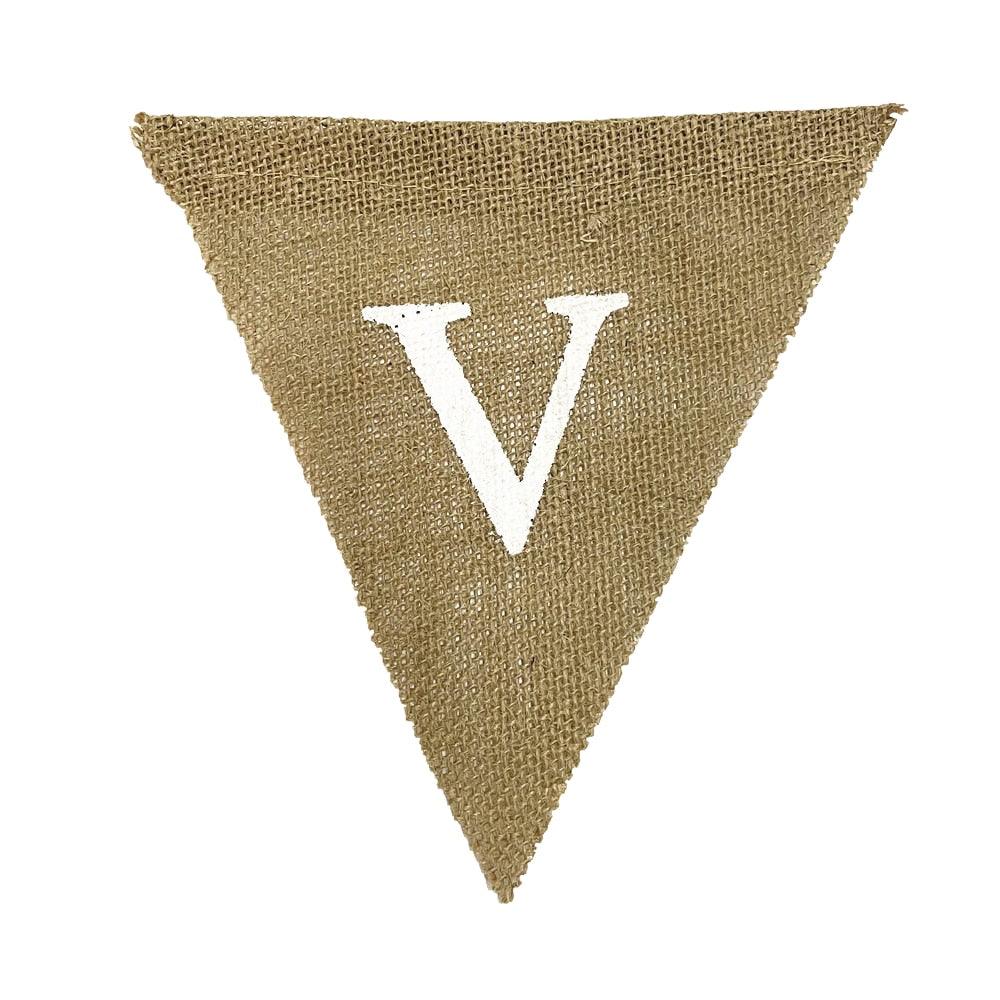 a triangle shaped burlock with the letter v on it