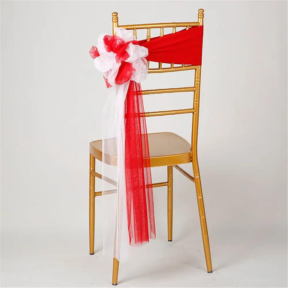 a chair with a red and white sash on it