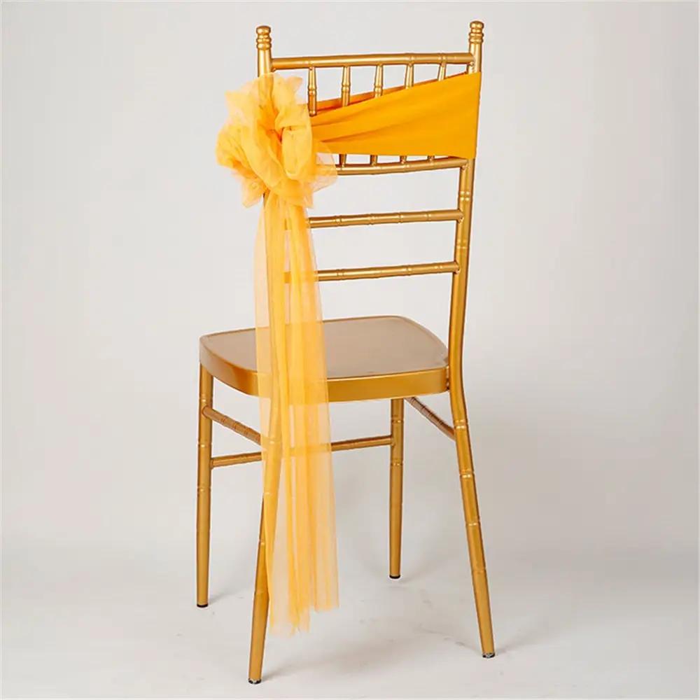 a chair with a yellow sash on top of it