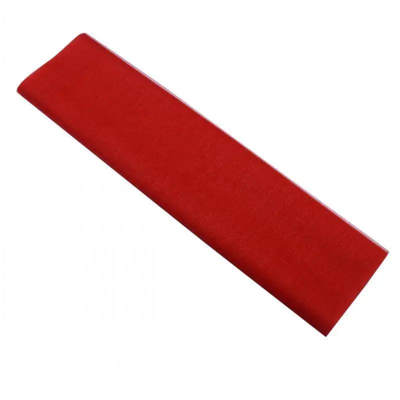 a red sponge on a white background