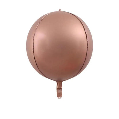 a pink ball hanging from a hook on a white wall