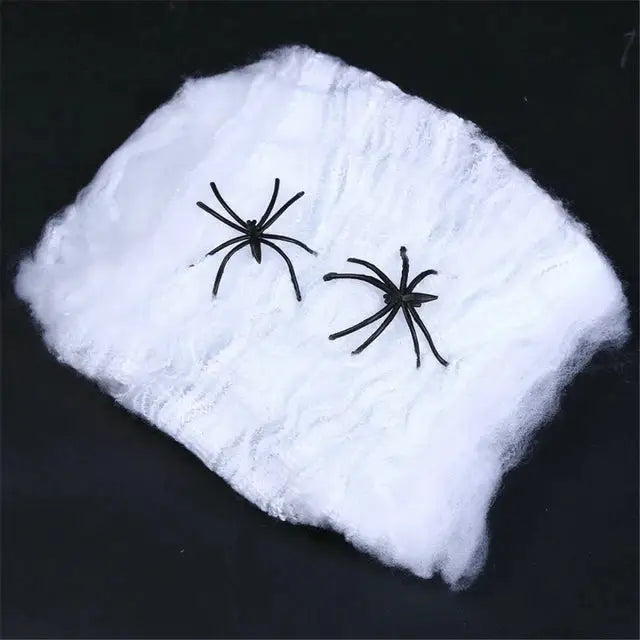 a close up of a towel with a spider on it